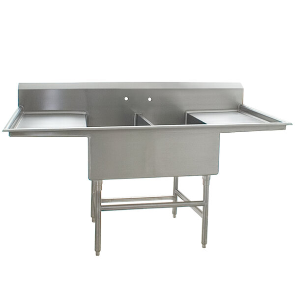 A stainless steel Eagle Group commercial compartment sink with two sinks and two drainboards.