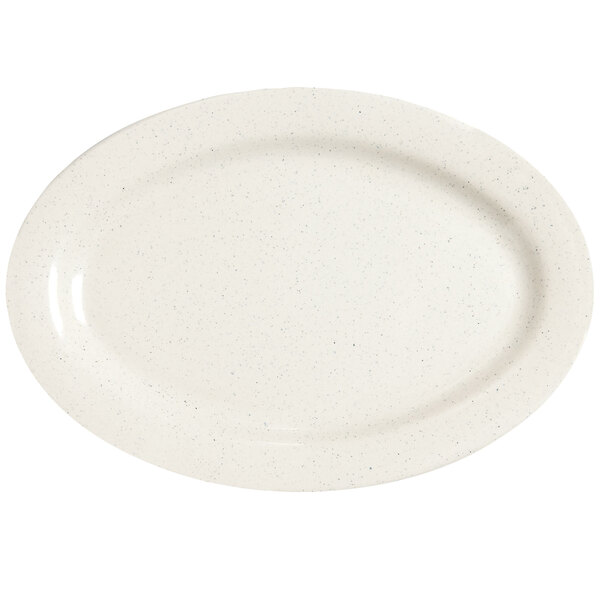 A white oval platter with speckled edges.