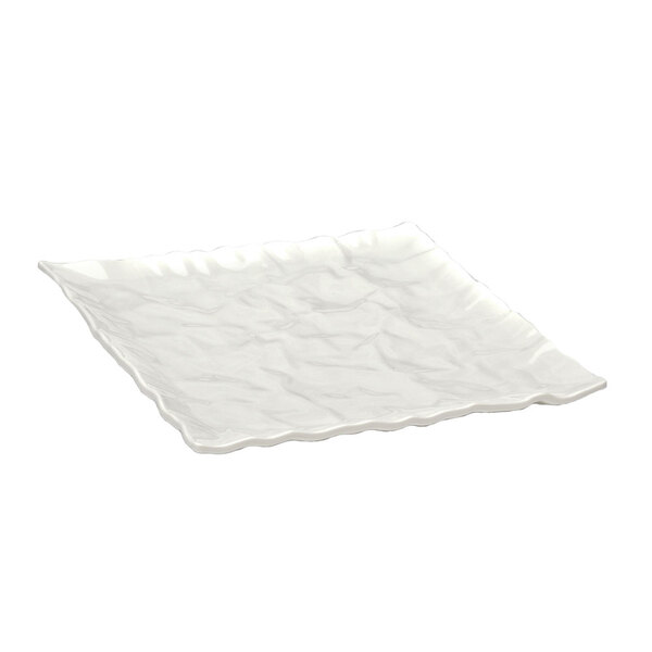 A white square melamine tray with wavy edges.