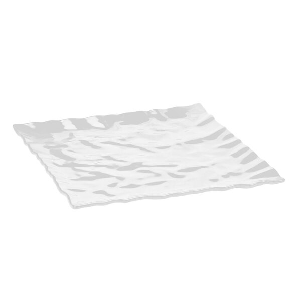 An Elite Global Solutions white square melamine tray with wavy edges.
