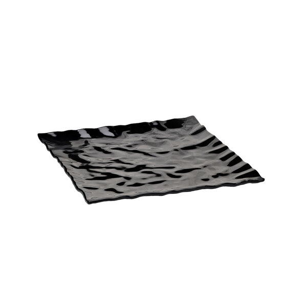 A black square melamine tray with wavy edges.