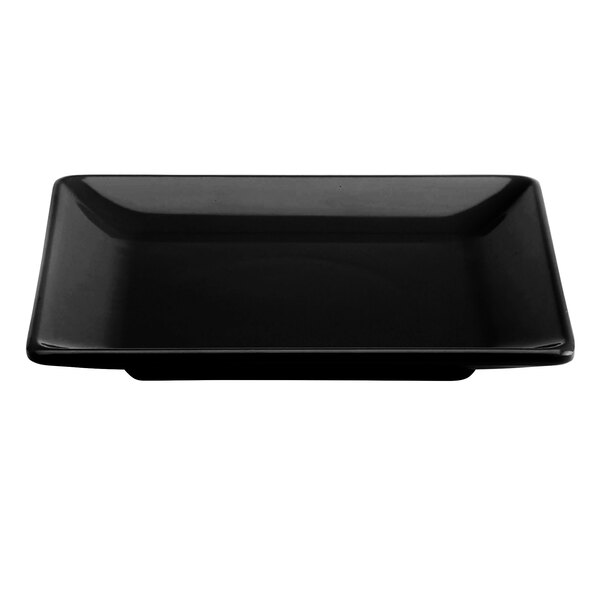 A black square melamine plate with a white border.