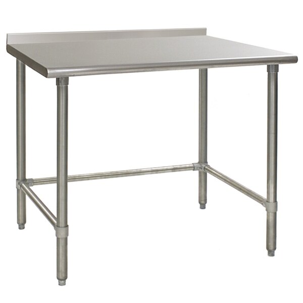 A Eagle Group stainless steel work table with an open base and backsplash.