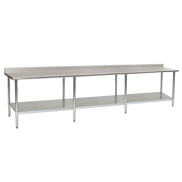 A long metal Eagle Group stainless steel work table with a galvanized undershelf.