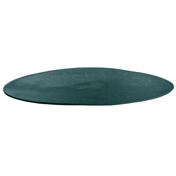 A hunter green and white speckled oval platter with a blackboard background.