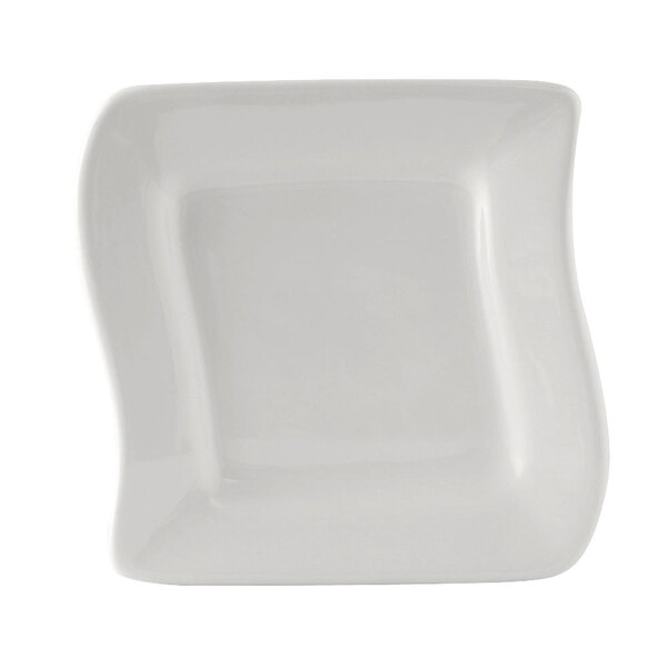 A white square Tuxton china plate with a curved edge.