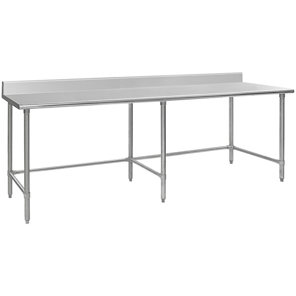 A long stainless steel rectangular work table with an open base and a backsplash.