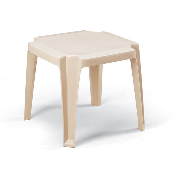 A white plastic Grosfillex low table with legs.