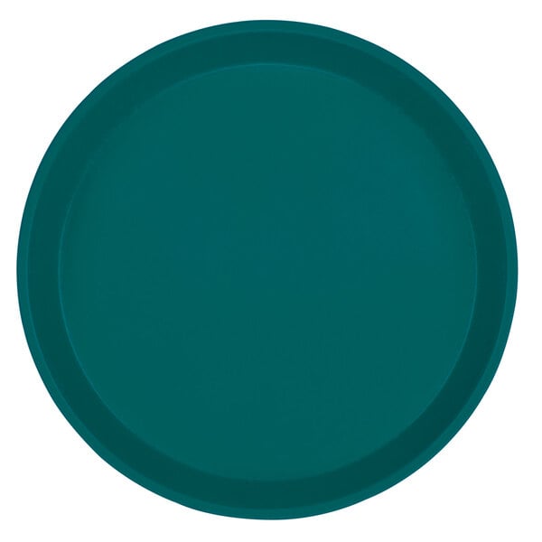 A teal round Cambro tray with a white background.