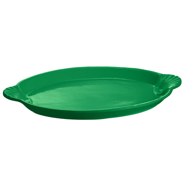 A green cast aluminum oval shell platter with handles.