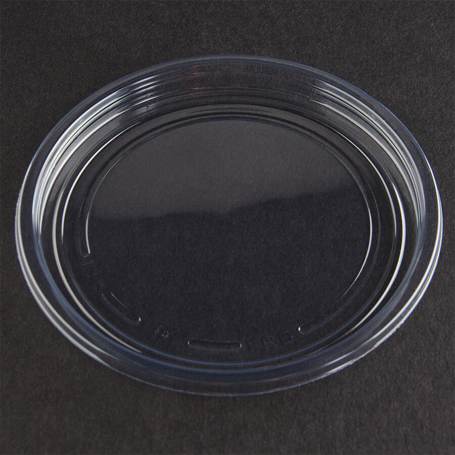 clear round plastic container and lid