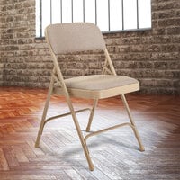 National Public Seating 2201 Beige Metal Folding Chair with 1 1/4 inch Cafe Beige Fabric Padded Seat
