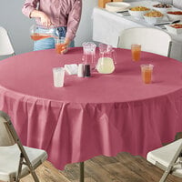 Creative Converting 703122 82 inch Burgundy OctyRound Disposable Plastic Table Cover - 12/Case