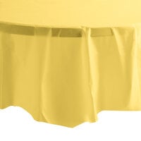Creative Converting 703266 82" Mimosa Yellow OctyRound Disposable Plastic Table Cover - 12/Case