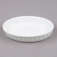 Tuxton BWK-0602 6 oz. White Oval Fluted China Souffle / Creme Brulee Dish - 12/Case