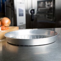 American Metalcraft PA90151.5 15 inch x 1 1/2 inch Perforated Standard Weight Aluminum Tapered / Nesting Pizza Pan