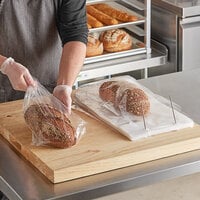 LK Packaging 10BG-097515W 9 3/4 inch x 4 1/2 inch x 15 inch Plastic Food / Bread Bag on Wicket Dispenser - 1000/Box