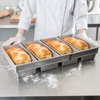 Chicago Metallic 44765 1 1/2 lb. 4-Strap Glazed Aluminized Steel Bread Loaf Pan - 12 inch x 5 inch x 3 1/2 inch