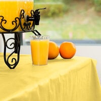 Creative Converting 013014 100' Mimosa Yellow Disposable Plastic Table Cover
