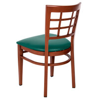 Lancaster Table & Seating Spartan Series Metal Window Back Chair with Mahogany Wood Grain Finish and Green Vinyl Seat - Detached Seat