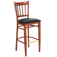 Lancaster Table & Seating Spartan Series Bar Height Metal Slat Back Chair with Mahogany Wood Grain Finish and Black Vinyl Seat - Detached Seat