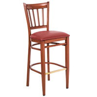Lancaster Table & Seating Spartan Series Bar Height Metal Slat Back Chair with Mahogany Wood Grain Finish and Red Vinyl Seat - Detached Seat