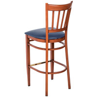 Lancaster Table & Seating Spartan Series Bar Height Metal Slat Back Chair with Mahogany Wood Grain Finish and Navy Vinyl Seat - Detached Seat
