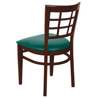 Lancaster Table & Seating Spartan Series Metal Window Back Chair with Walnut Wood Grain Finish and Green Vinyl Seat - Detached Seat