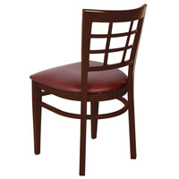 Lancaster Table & Seating Spartan Series Metal Window Back Chair with Walnut Wood Grain Finish and Burgundy Vinyl Seat - Detached Seat