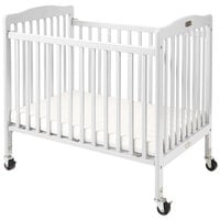 L.A. Baby CW-883A The Little Wood Crib 24" x 38" White Mini / Portable Folding Wood Crib with 3" Vinyl Covered Mattress