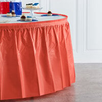 Creative Converting 743146 14' x 29 inch Coral Orange Plastic Table Skirt