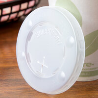 Solo L10BLN-0100 10 oz. Translucent Flat Plastic Lid with Straw Slot and Identification Buttons - 100/Pack