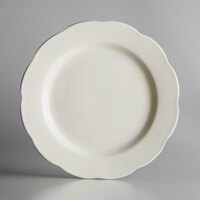Choice 10 3/4 inch Ivory (American White) Scalloped Edge Stoneware Plate - 12/Case