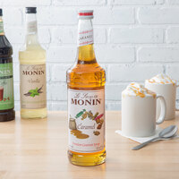 Monin 750 mL Premium Caramel Flavoring Syrup