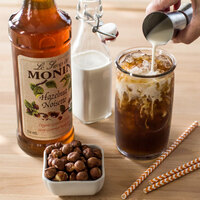 Monin 750 mL Organic Hazelnut Flavoring Syrup