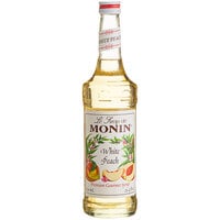 Monin 750 mL Premium White Peach Flavoring / Fruit Syrup