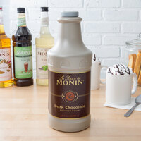 Monin 64 fl. oz. Dark Chocolate Flavoring Sauce