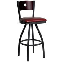 BFM Seating Darby Sand Black Metal Bar Height Chair with Mahogany Wooden Back and 2" Burgundy Vinyl Swivel Seat