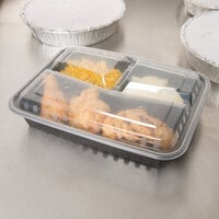 Choice 32 oz. Black 9 3/4 inch x 7 1/4 inch x 2 inch 3-Compartment Rectangular Microwavable Heavy Weight Container with Lid - 25/Pack