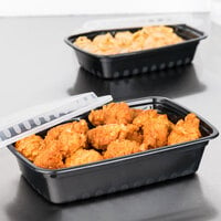 Choice 38 oz. Black 8 3/4 inch x 6 1/4 inch x 2 inch Rectangular Microwavable Heavy Weight Container with Lid - 25/Pack