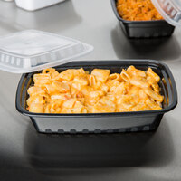 Choice 24 oz. Black 8 inch x 5 1/4 inch x 1 1/2 inch Rectangular Microwavable Heavy Weight Container with Lid - 10/Pack