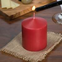 Sterno 40160 3 1/2 inch Red Wax Pillar Candle - 12/Case