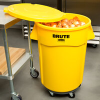 Rubbermaid BRUTE 44 Gallon Yellow Round Trash Can with Lid and Dolly