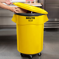 Rubbermaid BRUTE 55 Gallon Yellow Round Trash Can with Lid and Dolly