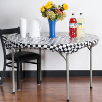 Creative Converting 37297 Stay Put Black Check 60 inch Round Plastic Tablecloth with Elastic