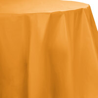 Creative Converting 323379 82" Pumpkin Spice Orange OctyRound Disposable Plastic Table Cover - 12/Case
