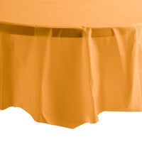 Creative Converting 323379 82 inch Pumpkin Spice Orange OctyRound Disposable Plastic Table Cover - 12/Case