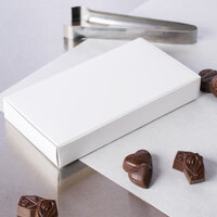 7 1/2 inch x 4 inch x 1 1/8 inch White 1/2 lb. 1-Piece Candy Box   - 25/Pack