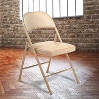 National Public Seating 951 Commercialine Beige Metal Folding Chair with Beige Padded Vinyl Seat