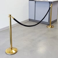 Lancaster Table & Seating Black 8' Stanchion Rope with Gold Ends for Rope Style Crowd Control / Guidance Stanchion
